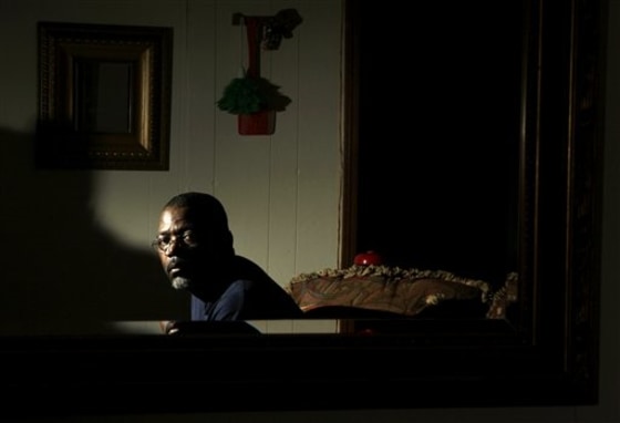 James V. Taylor poses for a photo in his home Wednesday, Sept. 1, in Park Hills, Mo. Police found such a small amount of crack cocaine in Taylor's car that investigators described it as unweighable but it was enough for a 15-year prison sentence in Missouri, where the courts make an enormous distinction between crack and powder cocaine. Taylor is now out on parole after serving four years of the sentence.